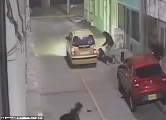 Security camera in Bogota, Colombia, captured the killer leaning over the singer and continuing to shoot before fleeing