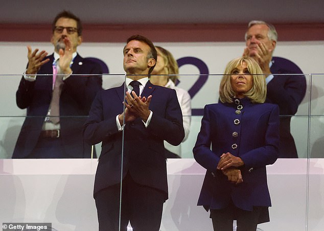 French President Emmanuel Macron and Brigitte Macron enjoy the spectacle during the Closing Ceremony on day eleven of the Paris 2024 Summer Paralympic Games at the Stade de France on September 8, 2024