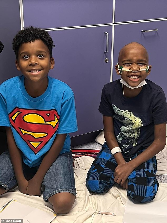 Alarm bells rang when Aden suffered a head injury during football training that left him with severe headaches and nausea, two typical symptoms of a concussion. Pictured here, Aden (right) and Alec (left) during their treatment