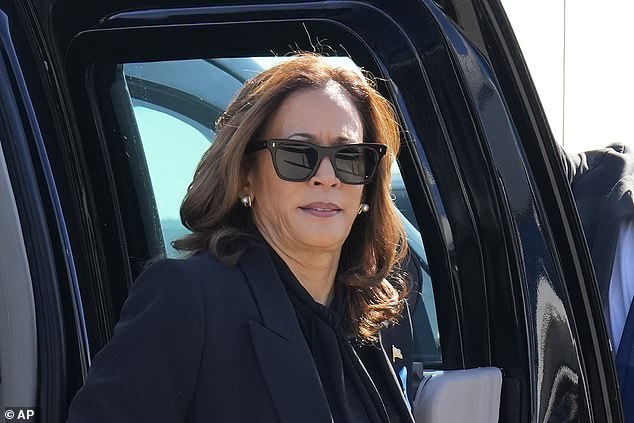 Democratic presidential candidate Vice President Kamala Harris exits her vehicle as she prepares to board Air Force Two