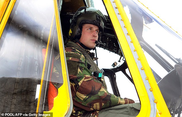 William is pictured at the controls of a Sea King helicopter during a training exercise at Holyhead Mountain, having flown in from RAF Valley in Anglesey, North Wales, on March 31, 2011.