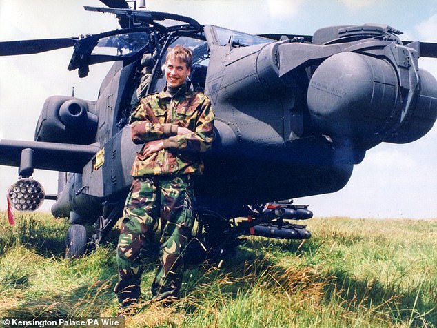 William is pictured in 1999 leaning against a helicopter during a visit to the Army Air Corps.