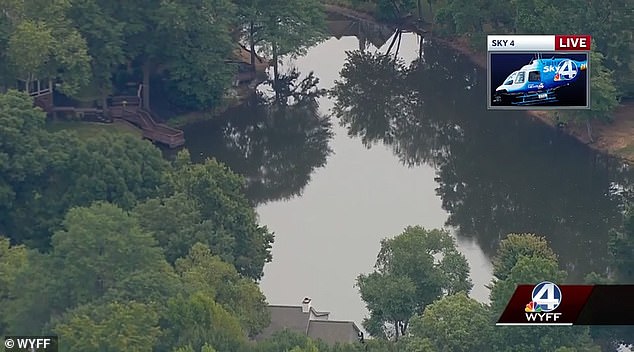 Following her disappearance, authorities searched the local area before a diving team discovered her body a short distance from the school in a pond, seen here.