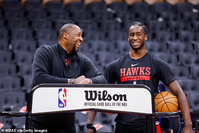 The forward is the son of former Milwaukee Bucks coach Adrian Griffin (right).