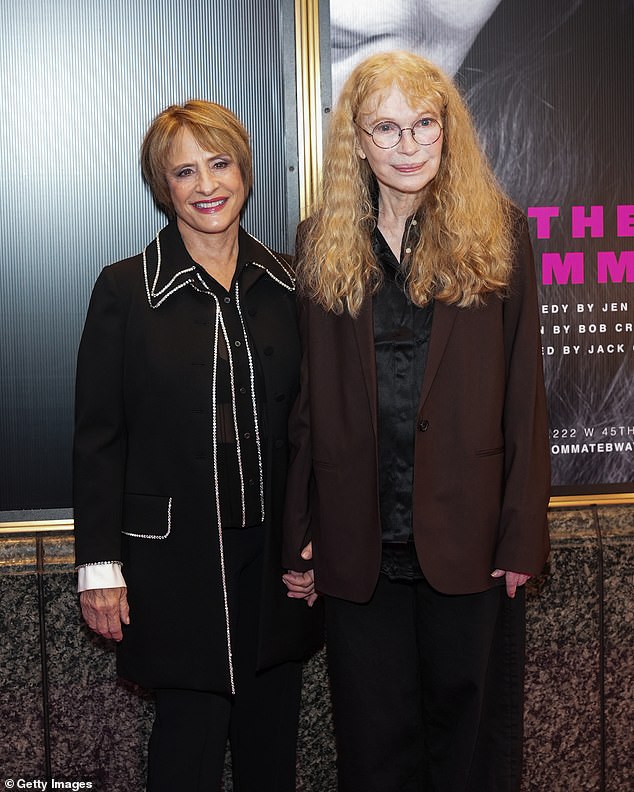 Mia Farrow stepped out in a black blouse under a brown jacket as her wavy locks fell over her shoulders.