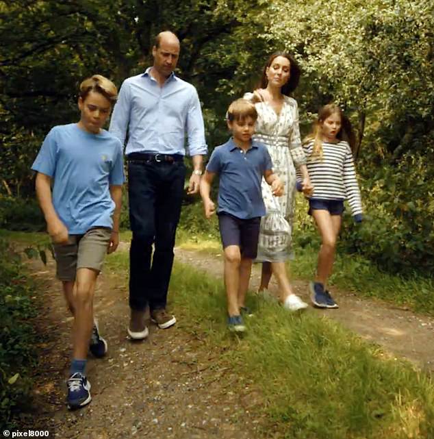 The family stroll through a wooded area in Norfolk during Kate's recent video