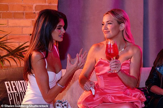 After dazzling on the red carpet, the Hollywood actress, 45, relaxed with a cocktail as she joined the supermodel, 23, on the party sofa.