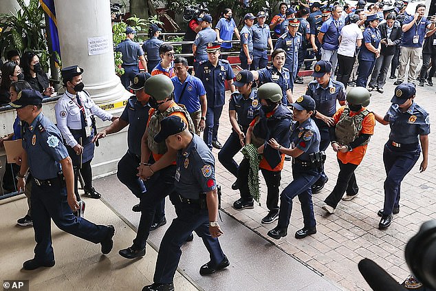 Some of Quiboloy's acolytes are brought to court with him.