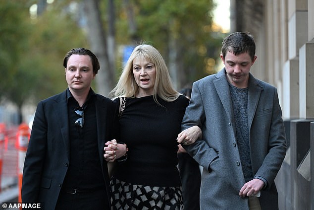 Geordie, Melanie and Elliott Lynn leave the Supreme Court of Victoria in May