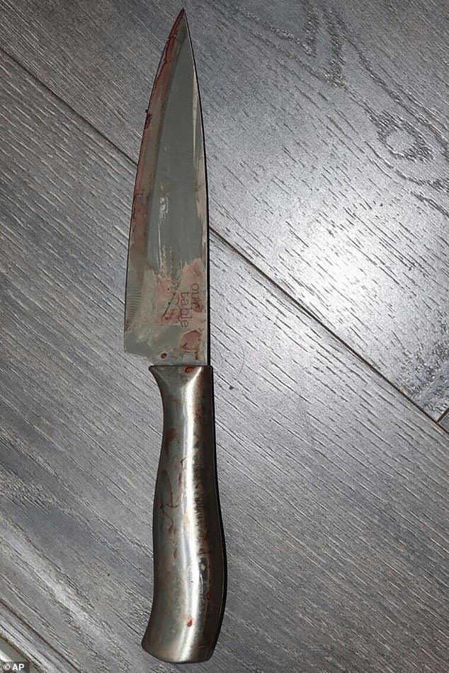 The college freshman was arrested Sunday after calling 911 alleging Catherine fell on a knife as she attacked him while holding the weapon, as seen in the image. Police say the depth of the wound indicates murder, not an accident.