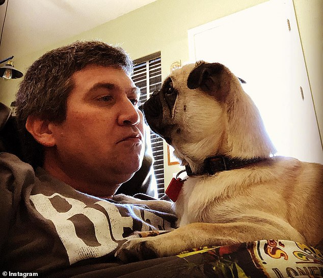 According to the Maricopa County Medical Examiner's Office, the former child star died at the age of 46 in June due to heat exposure in the context of cirrhosis of the liver, TMZ reported Friday; he is pictured with his beloved pug Hans in a snap on social media.