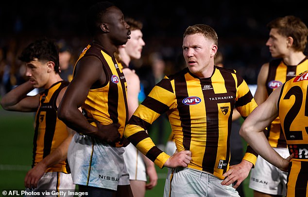 Hawks captain James Sicily has hit back at Port Adelaide coach and defended his young teammate Jack Ginnivan.