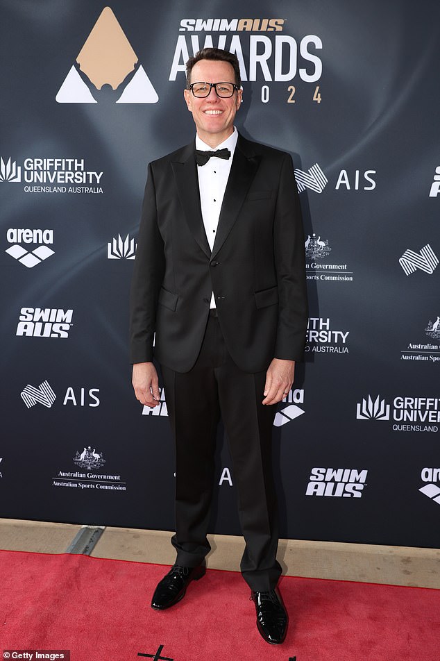 Veteran swimmer Kieren Perkins, 51, was also in attendance and looked dapper in a designer black tuxedo paired with a smart white T-shirt and black dress shoes.