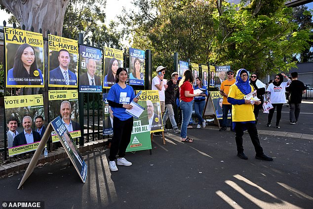 Posters are displayed during the New South Wales local council election day at Bankstown Public School