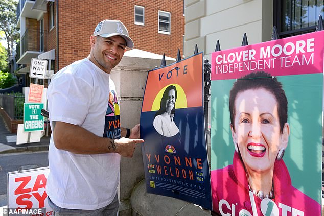 NRL player Will Smith poses for a photo during the New South Wales local council election day at Redfern Town Hall in Sydney