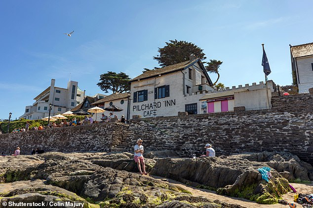 The Pilchard Inn (pictured) is only accessible via the stunning Bigbury Tombolo tidal beach.