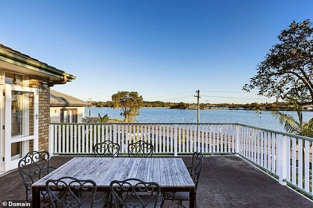 The following year they submitted plans to Canada Bay City Council to demolish the property and rebuild it with a carport beneath a large cantilevered balcony with a pool, decking area and outdoor dining space (pictured: the property's current balcony).