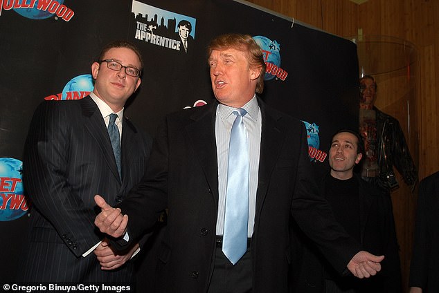 Trump is pictured with contestant David Gould, whom he abruptly fired in the first season in a decision that surprised producers.