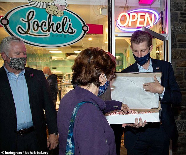 The buttery cookies are topped with red and white or blue and white sprinkles with a Trump 2024 or Harris 2024 banner in the center.