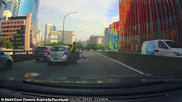 The car left a slow-moving lane without warning and struck the motorcyclist.