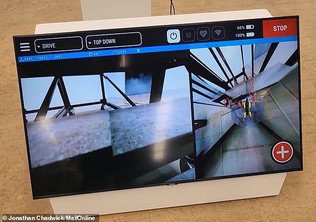 Rover's field of view is shared on a large screen as it successfully climbs the stairs (before falling off later on the return trip).