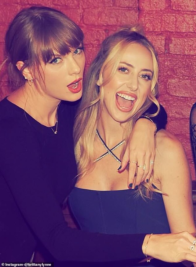 Later that month, Taylor put his arm around Taylor while hanging out with other Chiefs WAGs.