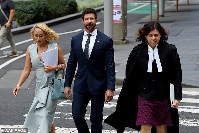 Former Special Forces Commando Heston Russell (pictured centre) with his solicitor Rebekah Giles (left) and solicitor Sue Chrysanthou, SC (right)