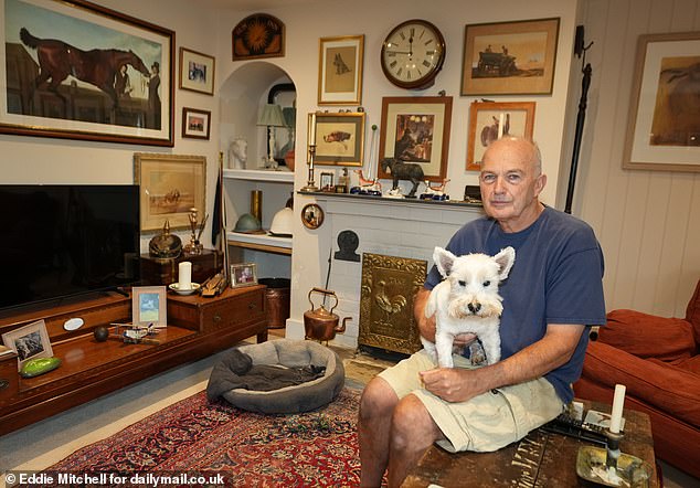 Mr Harman (pictured with his dog Paddy) moved into the stone cottage with magnificent rural views in the small village of Tarring Neville, East Sussex, in March 2002, paying just £550 a month.