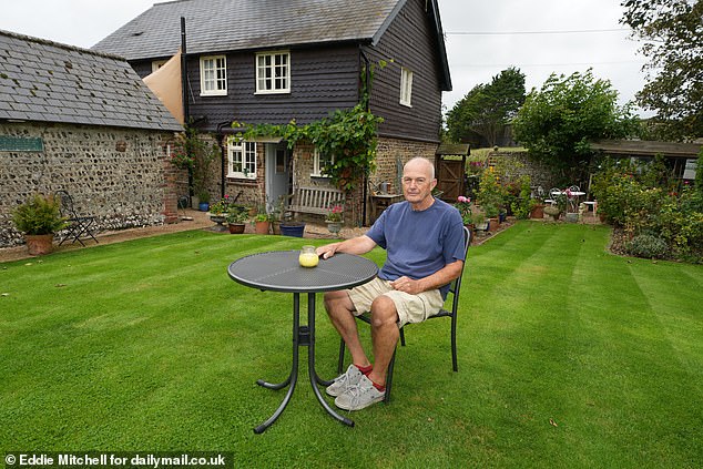 Mr Harman is seen here in the garden of his Victorian home and has been trying to fight the eviction ever since.