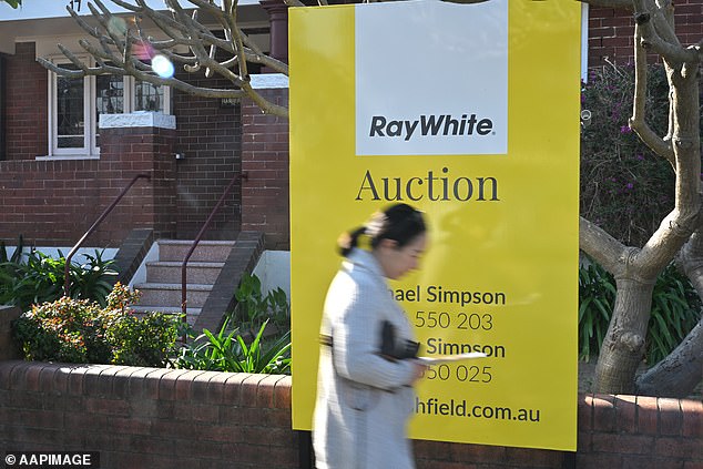 The new date shows that repayments on a $500,000 30-year mortgage reached $3105 per month for the June quarter of 2024. Pictured is an open house inspection in Sydney's inner west.