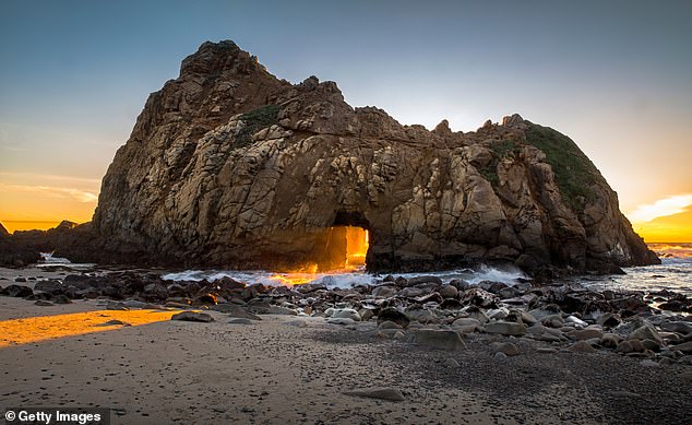 California's Pfeiffer Beach makes the list for its unique purple sand and secluded vibe. (Pictured: Sunset at Pfeiffer Beach in Big Sur, California)