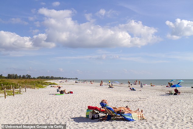 Bowman's Beach on Sanibel Island in Florida is ranked number 39 overall and offers a paradise for nature lovers and shell hunters (pictured: Bathers at Bowman's Beach)