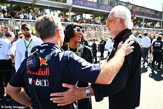 She was seen catching up with her ex-fiancé Flavio Briatore (right), who she was engaged to in the early 2000s, and also met up with Christian Horner.