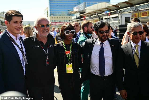 Naomi seemed thrilled to be mixing with the sport's stars, at one point stopping to pose with Flavio and FIA President Mohammed Ben Sulay.