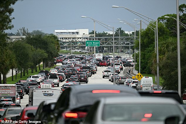 Traffic in West Palm Beach as police close roads outside Trump International Golf Club after shots were heard near the former president, who was playing golf.