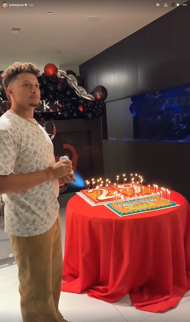 The mother of two shared a video of the signalman blowing out his candles on Instagram.