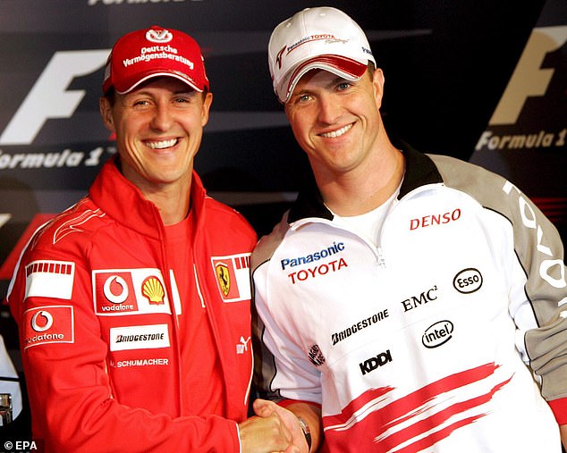 Ralf, a six-time Grand Prix winner, competed between 1997 and 2007. He is pictured with his legendary brother Michael, left.