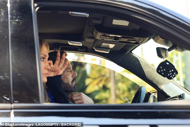 While some fans had suggested that J Lo appeared to be wiping her nipples in the car, Judi instead suggested she was simply scratching her face.