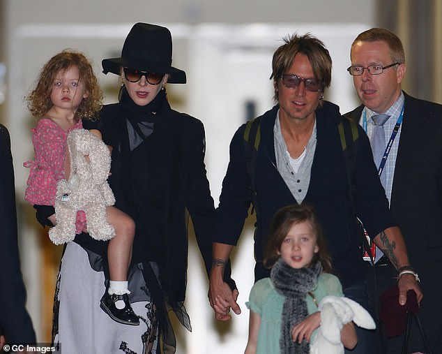 Nicole has two biological daughters with husband Keith Urban, pictured in 2014 in Sydney.