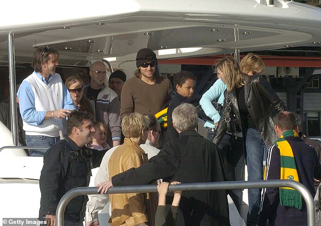 Connor is pictured with Keith Urban ahead of his wedding to Nicole Kidman on a boat in Sydney Harbour in 2006.