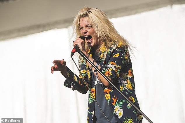 Wild child Alison has been the frontwoman of rock band The Kills alongside Jamie Hince since 2001 and was also in The Dead Weather with Jack White (pictured on stage last month).