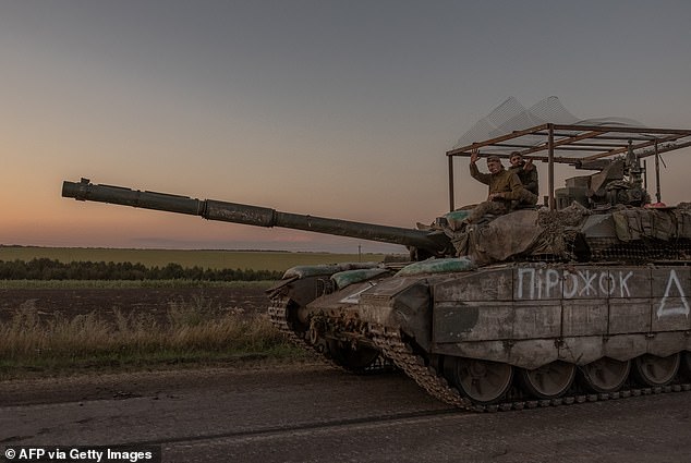 Ukrainian servicemen operate a tank on a road near the border with Russia, in the Sumy region of Ukraine, August 14, 2024.