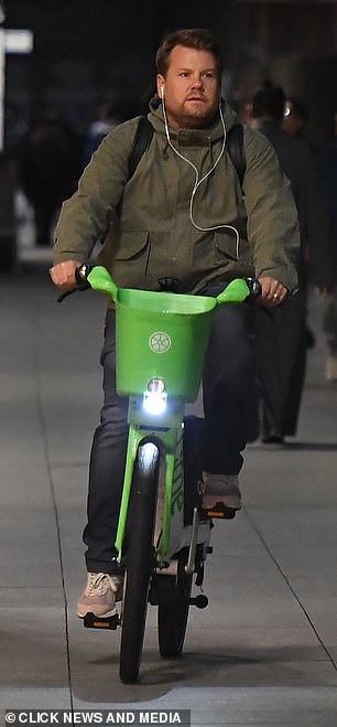 James then hopped on a Lime rental bike and put on his headphones as he cycled around the capital.