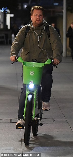 James then hopped on a Lime rental bike and put on his headphones as he cycled around the capital.