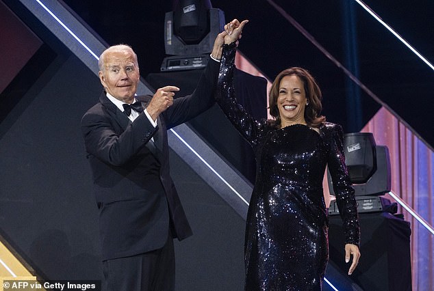 U.S. President Joe Biden welcomes Vice President and Democratic presidential nominee Kamala Harris to the stage during the Phoenix 2024 Awards Dinner at the Washington Convention Center in Washington, DC, September 14, 2024.