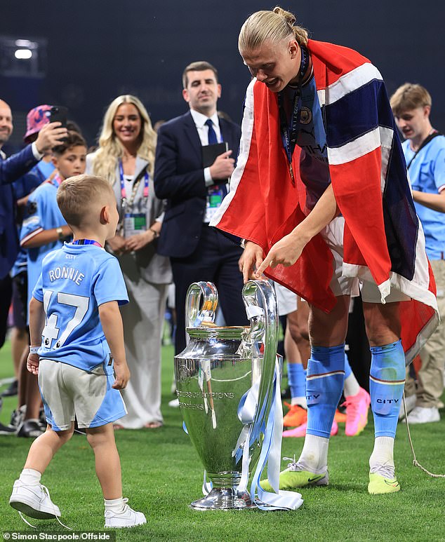 Ronnie was seen enjoying Manchester City's 2023 treble with Erling Haaland