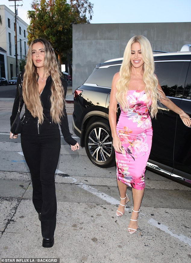 Despite her rumoured financial troubles, the 46-year-old reality star appeared in good spirits as she treated her eldest son, 27, to a posh dinner at the celebrity hotspot, which is frequented by A-listers including Kim Kardashian and George Clooney.