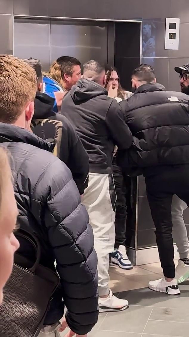 One man (third from right) appeared to be punched in the face during the incident, leaving one man with what police called 