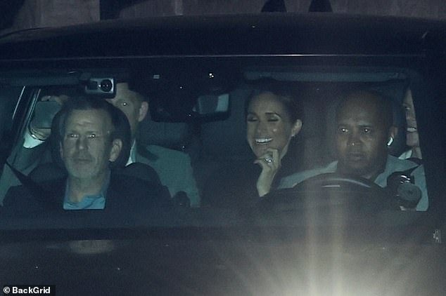 They appeared to be in high spirits as Meghan, 43, was pictured smiling and laughing alongside her husband, 40, in the backseat of a black Range Rover.