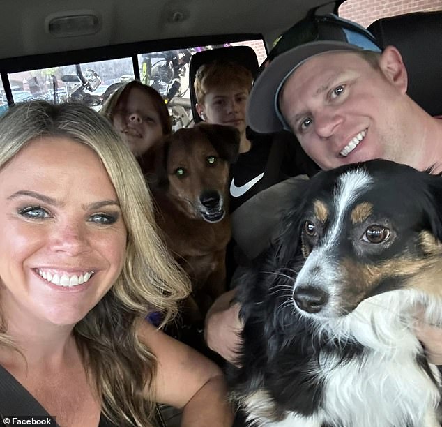 Kristin (pictured with her family and two dogs, but not Aussie) says she is still heartbroken over the loss.